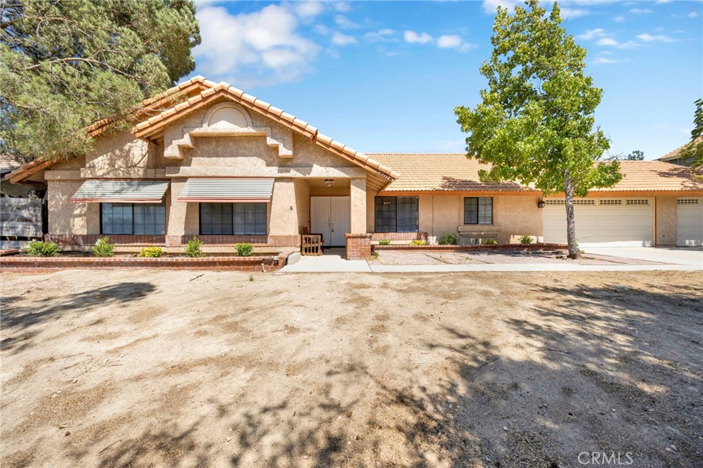 Spacious and beautifully updated, this 4-bedroom, 3-bath home in Palmdale offers 2,051 sq ft of comfortable living space on an expansive 40,255 sq ft lot with endless potential. Inside, you'll find new flooring, fresh interior paint, and a completely refreshed kitchen featuring updated countertops, brand-new appliances, and freshly painted cabinets. The home also includes a 3-car garage and sits on a massive lot with space for a variety of uses. Located just off Pearblossom Highway with quick access to the 14 Freeway, it's close to schools, shopping centers, and everyday conveniences. Whether you're a large family looking for room to grow or seeking a versatile property with space to customize, this is an opportunity you don’t want to miss.