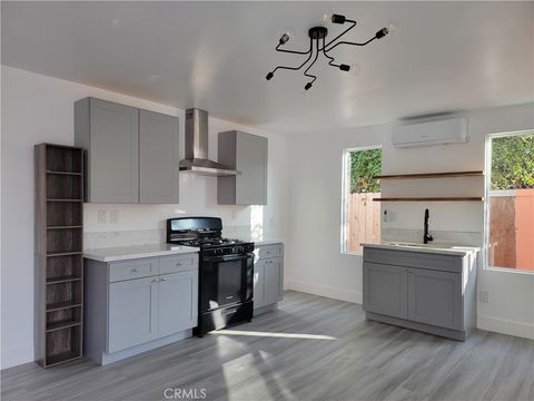 Photo of 718 E 48th, Los Angeles, CA 90011 (MLS # PW26028717)