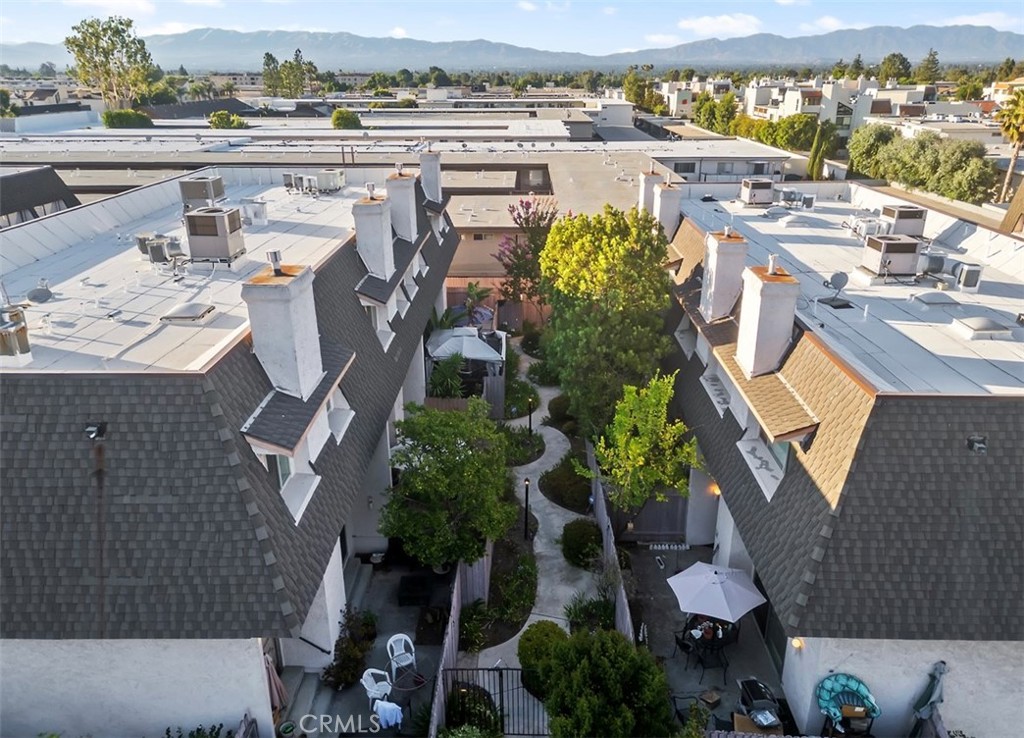 Beautifully remodeled tri-level townhome in the heart of Encino, available for short-term lease. This spacious home features hardwood flooring throughout, a fireplace in the living room, and a modern kitchen with granite and marble finishes, European-style cabinets, and stainless-steel appliances. Enjoy access to the community pool and relax or entertain on the large private patio. The unit includes an attached two-car garage with laundry inside. Offered unfurnished at $3795 a month but also available furnished at a higher rental rate.