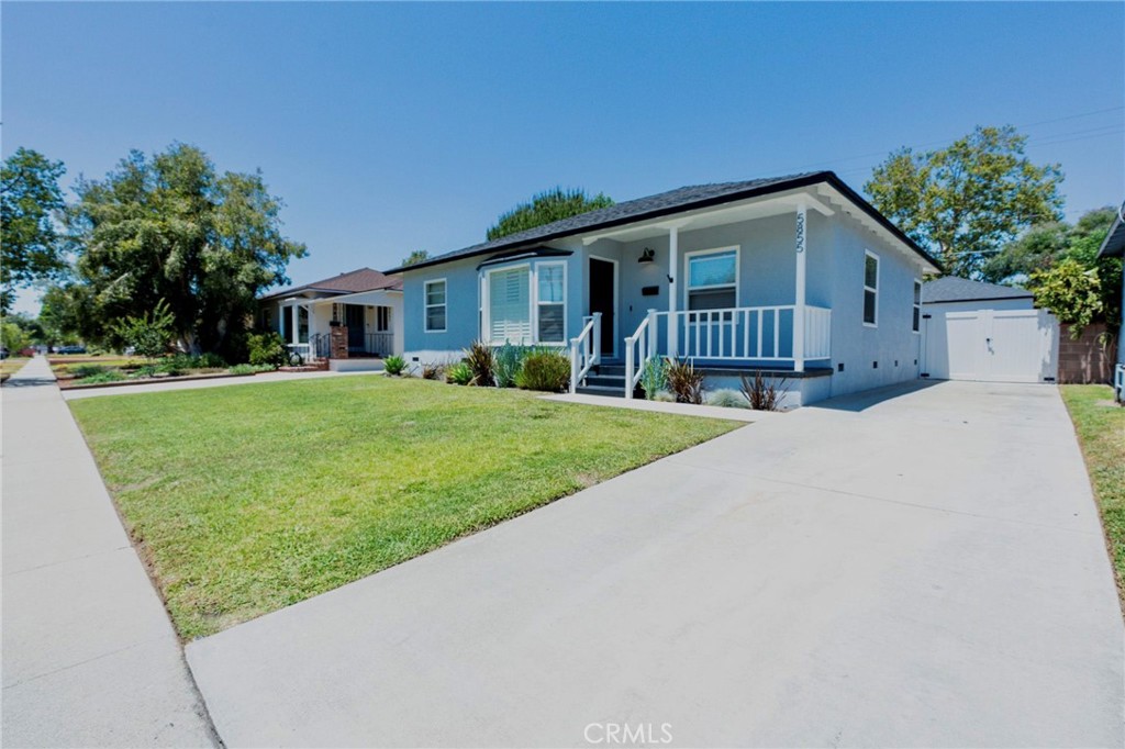 Welcome to this charming 3-bedroom, 1-bath home located in the city of Lakewood Ca. This well-maintained single-story home offers 1,138 sq ft of living space on a spacious 5,510 sq ft lot. Inside, you'll find hardwood floors, a bright living room, and a cozy dining area which opens up to the kitchen. All bedrooms are generously sized and the bathroom has been tastefully updated with a large tiled shower and a stand-up soaking tub, perfect for relaxing at the end of the day. Step outside to a backyard built for enjoyment—featuring a detached office ideal for remote work or creative space, a wood deck perfect for lounging or entertaining, and a built-in floor fire pit to enjoy year-round. Additional highlights are a long driveway, and a detached 2-car garage. Located near parks, schools, shopping, and freeways, this Lakewood gem is not to be missed!