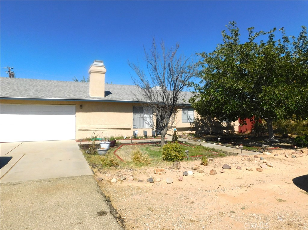 Lovely ranch style home with three nice sized bedrooms and baths. Large semi-open concept living room, dining room, and kitchen. All white appliances. Landscaping and mature trees in front yard. Backyard completely fenced with garden shed. Don't miss out, schedule a viewing today.
