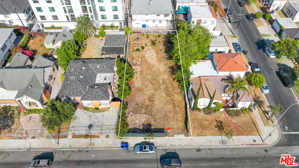 Don't miss this rare opportunity to build a 20-unit multifamily project "Near RTI" in the highly sought-after Picfair Village neighborhood! Currently vacant land, you'll save approximately $70,000 in demolition costs with no tenant relocation required! This offering includes completed Architectural Plans, Structural Plans, Survey, Soils Report, and Landscape Plan, saving you both time and money in pre-construction. The approved design features a 5-story apartment building with one level of subterranean parking, perfectly suited for the area's strong rental demand. Subject property is zoned (Q)R3-1 with a lot size of 6,886 sqft (55 by 125 ft). Also an excellent candidate for an ED-1 100% fully affordable project! Enjoy a central location just moments from local dining, shopping, and public transportation, ideal for future tenants seeking convenience and lifestyle. Minutes from the Grove, LACMA, the 10-Freeway, and more. Offered As-Is. Contact listing agent for more details or full set of plans. Seller makes no warranties or representations regarding the existing plans.