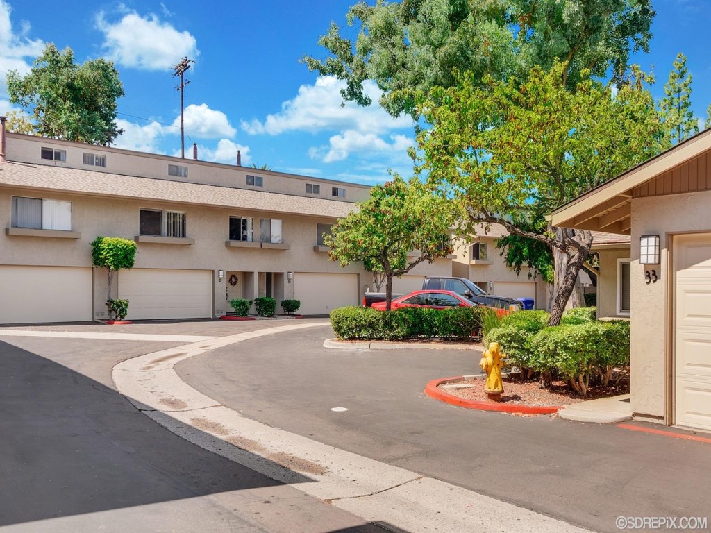 Popular La Mesa Racquet & Swim Club with 2 Tennis Courts, Pool and Spa. This townhouse style condo is the 2 bedroom, 1 bath model with vaulted wood ceilings in living room, dining room and both bedrooms. Ceiling fan. There is a bonus loft. Also a rare 2 car garage with direct access to unit. Extra parking permit issued for "first come basis." Air-Conditioned. Private patio off the living room and dining room. Nice open space kitchen. Close to Freeway 8, SDSU, shops and restaurants. 1 pet allowed. Neighborhoods: La Mesa Racquet & Swim Club Complex Features: ,,, Other Fees: 0 Sewer: Sewer Connected Topography: LL,