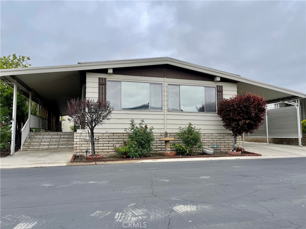 Charming Mobile Home in the Desirable Soboba Springs Community. Welcome to this well maintained mobile home nestled in the serene Soboba Springs Mobile Home Park—a peaceful, gated 55+ community located right next to the Soboba Casino and golf course in San Jacinto, CA. This home offers 2 bedrooms, 2 bathrooms, a spacious open floor plan, and plenty of natural light. The kitchen features a built in stove, range hood, dishwasher and ample cabinetry, the large living room and dining areas are perfect for entertaining or cozy nights in. Enjoy relaxing mornings on the private covered patio with mountain views, or take a short stroll to the community lake. Soboba Springs residents enjoy a resort-style lifestyle with access to a clubhouse, gym, pool, spa, shuffleboard, and social activities. You'll love the well-kept grounds, scenic views, and the convenience of nearby shopping, dining, and medical services. this charming home features Central A/C and heating, Covered carport, Washer/dryer hookups, fruit trees and low-maintenance landscaping, pet-friendly park (with restrictions) Don't miss this chance to enjoy comfort, tranquility, community, and convenience in one of San Jacinto’s most desirable mobile home parks!