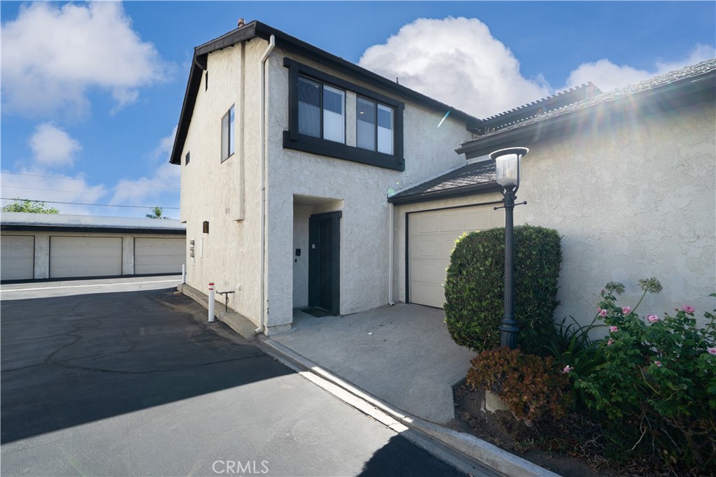Welcome to 1004 W Duarte Rd #6, a sophisticated townhome-style residence situated in the highly sought-after city of Arcadia. Blending timeless design with modern comfort, this home offers an exceptional lifestyle in one of the San Gabriel Valley’s most prestigious communities. Upon entry, you are greeted by a well-designed stairway to an expansive living area filled with natural light, creating an inviting space ideal for both relaxation and entertainment. The thoughtfully designed floor plan flows seamlessly into a well-appointed kitchen with ample cabinetry and updated countertops, ready for your culinary creations. Upstairs, generously sized bedrooms provide a private retreat, while the primary suite offers comfort and elegance with its spacious layout. Additional highlights include an attached two-car garage with direct access, in-unit laundry, central air and heat, and a private outdoor patio perfect for al fresco dining. This unit has no shared walls and is a single-standing unit. Residents will enjoy close proximity to world-class shopping at Westfield Santa Anita, the Los Angeles County Arboretum, Santa Anita Park, and a wide selection of renowned dining and cultural destinations. With top-rated schools, convenient freeway access, and a well-maintained community, this home exemplifies the best of Arcadia living.
Experience the perfect balance of luxury and convenience—schedule your private showing today.