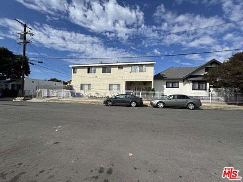 Photo of 3945 Denker Avenue, Los Angeles, CA 90062 (MLS # 26672817)