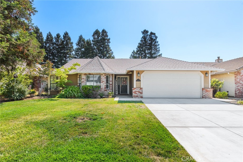 Tucked in a quiet cul-de-sac near Baroni Park and the ever-popular Meriam Park, this home offers both comfort and convenience. You’re greeted by a freshly poured concrete driveway and classic brick accents that add to its curb appeal. Inside, neutral tones, newer laminate flooring, and a cozy brick-lined fireplace with a pellet stove insert create a warm, inviting feel. The layout features both a living and family room—ideal for entertaining or everyday life. The open kitchen is a standout with quartz countertops, white cabinetry, newer appliances, a farm-style sink, and a center island with an electric cooktop. The breakfast nook overlooks the backyard—just right for your morning coffee.The spacious primary suite includes a walk-in closet, dual vanities, a clawfoot soaking tub, and a tiled walk-in shower. You'll also find recessed lighting, ceiling fans throughout, an indoor laundry area, two comfortable guest rooms, an attached two-car garage, and OWNED solar to help with energy bills. Love to host? The backyard is ready—with a tiled patio for summer BBQs, green space for gardening or play, mature trees for privacy, and a variety of fruit trees to enjoy year-round. It’s a peaceful, park-like setting that’s perfect for outdoor living. Walk to Baroni Park or enjoy nearby Meriam Park’s restaurants, coffee shops, and weekend farmer’s market. With its thoughtful updates and unbeatable location, this home checks all the boxes.