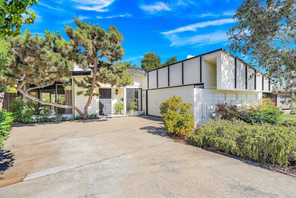Mid-Century delight in the heart of Serra Mesa! First time on the market from the original owners! This charming 4 bedroom, 2 bath home offers 1,720 sqft of well-maintained living space, perfectly situated in a quiet and established neighborhood in central San Diego. Step inside to discover a spacious main living area filled with natural light, thanks to large picture windows and an atrium, that bring the outdoors in. The home's classic mid-century design blends timeless style with everyday comfort. Enjoy the serenity of a beautifully landscaped backyard, complete with mature plants, a tranquil waterfall, and a peaceful fish pond. Located in the sought-after Serra Mesa community, you’ll love the proximity to top-rated schools, shopping, dining, and easy freeway access for commuting. Don’t miss this rare opportunity to own a beloved home in one of San Diego’s most convenient and welcoming neighborhoods!