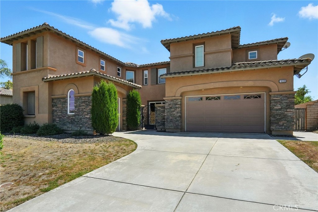 Welcome to this beautifully remodeled 5-bedroom, 3.5-bathroom estate in the exclusive Lake Hills Reserve community. Spanning over 5,000 sq ft on a generous 15,246 sq ft lot, this 2006-built home blends timeless elegance with modern comfort. Enter through a gated courtyard and into a grand foyer with a sweeping staircase, soaring ceilings, and abundant natural light. The gourmet kitchen features granite countertops, stainless steel appliances, a massive center island, and rich cherry wood cabinetry—seamlessly flowing into the spacious family room with custom built-ins and surround sound.
The main level offers an executive office with private entry, formal dining and living rooms with hardwood floors and fireplaces, and a large laundry room. Upstairs, the expansive primary suite is a true retreat, boasting a fireplace, spa-like bath with dual showers and soaking tub, two walk-in closets, and a private balcony showcasing breathtaking lake and canyon views. The guest suite features its own full bath, while three additional bedrooms offer generous space and comfort.
Outside, the fully landscaped backyard offers ample room for a pool and outdoor living. With smart home security features, crown molding throughout, and access to community amenities, this home is a rare blend of luxury, privacy, and functionality.
