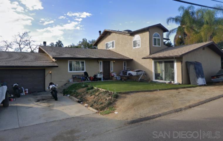On top of the mountain in quiet Crest, this 2-story open floor plan 4BR/2BA (~2,076 sq ft) includes a 2-car garage, rooftop solar, and Tesla batteries. Walk into a big greatroom with wood beam ceilings very open and spacious! The roof and windows were recently replaced and solar and batteries are paid in full! This Home needs some repairs & updates and is offered AS-IS. Approximately one block from the local K–8 school. A solid opportunity in a desirable East County location, 25 minutes to the Beaches or the Mountains!