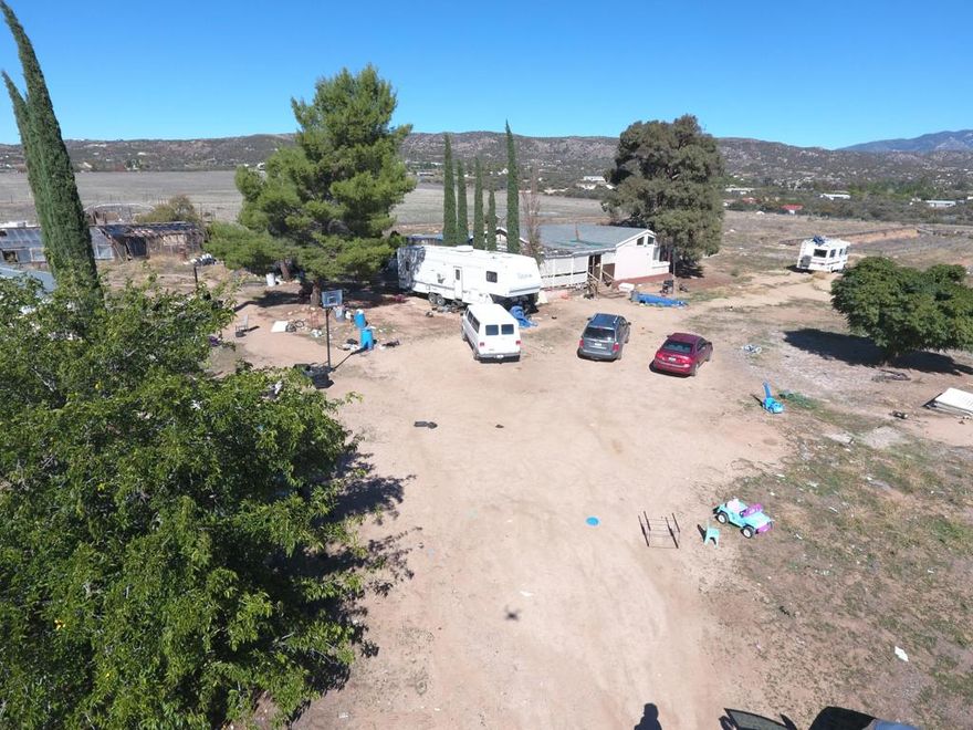 10 Acres with a 3 bedroom / 2 bath manufactured home on it.  Home is a fixer.  Lots of potential, great location.  Appointment only.  Property is occupied and has a dog.