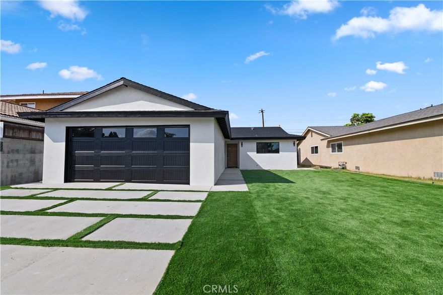 Modern Masterpiece in the Heart of Carson, CA!



Step into this stunning, fully renovated 4-bedroom, 2-bathroom home located in one of Carson’s most desirable neighborhoods. With 1,225 sq ft of beautifully crafted living space, this property offers a perfect blend of modern elegance, high-end finishes, and top-tier upgrades.



 Key Features:



Fully updated plumbing and electrical systems



Brand new HVAC for year-round comfort



New dual-pane windows for energy efficiency and natural light



Sleek LVP flooring throughout, adding a clean and modern touch



Designer kitchen featuring -style cabinets, a striking waterfall island with built-in stove and range hood, LED accent lighting, and electrical outlets—ideal for entertaining



Custom entertainment wall with LED-lit floating shelves and a smooth stucco finish, offering a luxurious focal point for your living room



Elegant master bathroom with dual vanity, LED-lit mirror, and tasteful modern finishes



Smooth stucco exterior finish giving the home a clean, sophisticated curb appeal



New pavers on the driveway and leading to the front entrance



Freshly poured concrete patio in the backyard, perfect for outdoor gatherings



Every inch of this home has been thoughtfully designed with quality and style in mind. From the gorgeous curb appeal to the custom interior touches, this home is truly one of the best-looking properties in all of Carson.

Ideally located near top-rated schools, parks, shopping, and major freeways—this home checks all the boxes for modern California living.