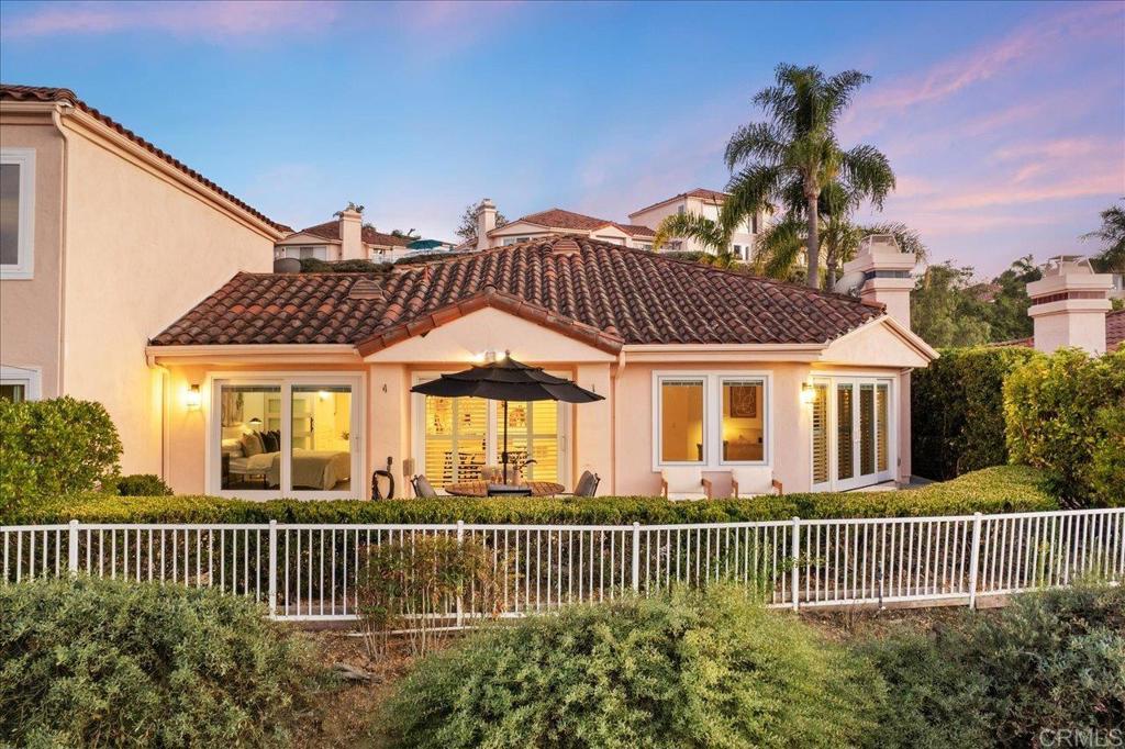 Welcome to 1262 Rue Saint Martin - a single story, completely remodeled home with designer touches and high end finishes throughout with one of the BEST views in The Colony of Lake San Marcos. Have you been searching for something more than ordinary? This could be what you have been looking for! No expenses were spared - from top of the line Pella windows and doors with plantation shutters, to high-end Kitchenaid appliances, to custom seagrass flooring to custom-built cabinetry in the primary bedroom, kitchen and guest bedroom to the pebble-tec finished garage. You can feel the elegance put into every nook of this home. Guest bedroom comes with a built-in office space and murphy bed. Vaulted ceilings make this 2 bedroom home feel even larger than it is. Complete with panoramic views of all of Lake San Marcos and the surrounding hills on a large wrap-around patio. This home is truly move-in ready.
