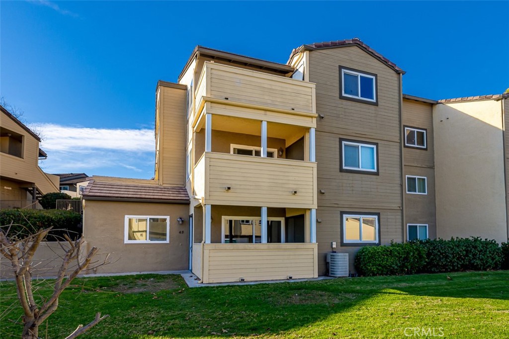 Discover this rare opportunity to purchase a beautiful, fully renovated 3-bedroom condo in the gated community of Stonemark at Los Morros. The 1,100 sq ft ground-level unit consists of 3-bedrooms/2-baths and is move-in ready! Renovations includes luxury vinyl floors, recessed lighting, new windows, and new doors. The kitchen features quartz countertops, SS sink, new dishwasher/oven/microwave, and soft close drawers & cabinets. The bathrooms have brand new tubs/showers, new sink vanities with quartz countertops, and modern light fixtures. The living room has sliding glass doors that lead to a private outdoor patio area perfect for relaxing in the sun or a morning cup of coffee. Additional features include a 1-car garage, an uncovered parking space, central AC and a laundry closet with washer/dryer hookups. Stonemark at Los Morros boasts a variety of amenities including a community pool, spa, gym, and playground. Just 10 miles from the beach and steps from shopping and dining, this turn-key condo offers convenience, comfort, and security - perfect for your first home.