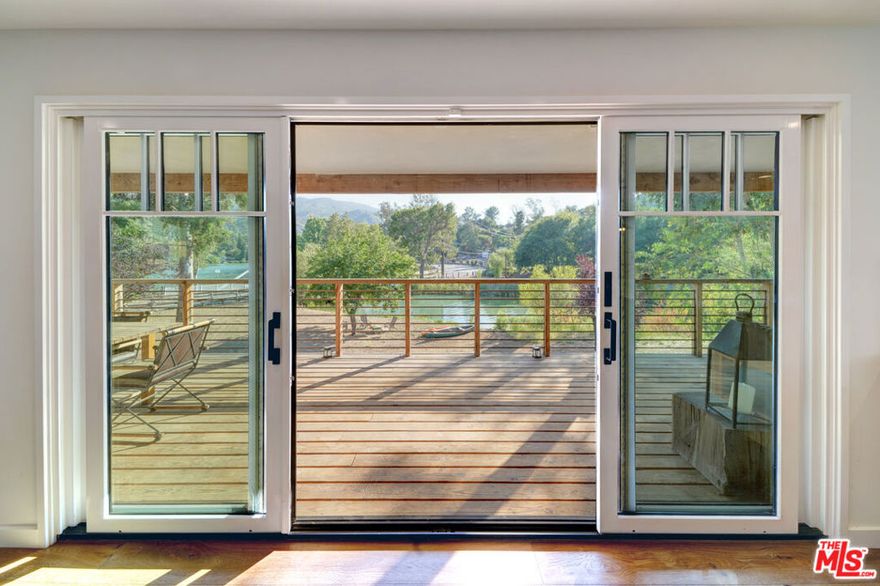 This newly built 2025 Modern Farmhouse will take your breath away. Tucked away on a private creekside setting in the prestigious gated community of Malibou Lake, this 3-bedroom, 3-bathroom residence offers the perfect balance of luxury, privacy, and natural beauty. Step inside to soaring ceilings, light-filled living spaces, and designer-curated finishes throughout. The heart of the home features a chef's kitchen with a massive center island, open-concept great room with fireplace, and seamless access to a wraparound terrace overlooking the water and mountains. The primary suite is a sanctuary with its own fireplace, spa-like bath, and soaking tub. Every detail was thoughtfully designed for both comfort and style. Beyond the home itself, leasing here means unlocking the coveted Malibou Lake lifestyle. The Historic Malibou Lake Mountain Club has access to a heated pool, pickleball and tennis courts, shaded picnic areas, and the sparkling lake itself perfect for swimming, sailing, boating, kayaking, and canoeing. Just minutes from Malibu's beaches, Calabasas, and the West Valley, this home offers the rare opportunity to live in a gated lakefront community while staying connected to LA's best dining, shopping, and schools. **Tenant Notes: One-time $250 initiation fee for lake privileges plus $100/month for lake amenities. Furnished lease option available for an add'l cost. This isn't just a home it's a lifestyle. Welcome to Malibou Lake!