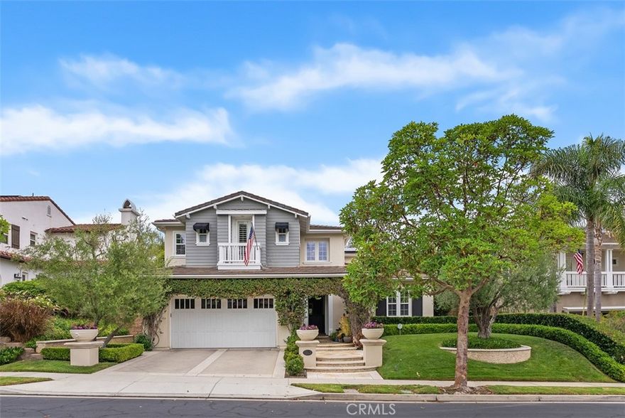 Tucked behind the gates of the prestigious Reserve East community, this exceptional 5-bedroom, 3-bath residence is more than a home—it’s a curated experience in refined coastal living. Every detail has been thoughtfully selected to blend sophistication, comfort, efficiency(owned solar panels) and timeless design. The Dutch door entry sets the stage for interiors that feel both welcoming and elevated. A Coffered ceiling frames the formal living space with architectural grace, while stone-clad feature walls in the formal dining and living rooms add depth and character. The den invites conversation around an expanded custom fireplace, enhanced by surround sound that flows effortlessly into the dining spaces. At the heart of the home, the chef’s kitchen dazzles with a striking quartzite slab island, Ann Sacks tile with shimmering glitter grout, and top-tier Sub-Zero, Wolf and Cove appliances with all the bells and whistles. Soft-close cabinetry, a walk-in pantry, and a beveled glass kitchen door elevate everyday moments into experiences of luxury. Throughout the home you will find Crown molding, bead board accents, framed windows, beveled leaded glass windows in all bathrooms offering privacy and light, plantation shutters, and a lacquered staircase which speaks to the home’s fine craftsmanship. The primary suite is a retreat unto itself—a serene sanctuary with a sitting area, custom walk-in closets, and a spa-inspired bathroom adorned with Silestone countertops, a generous walk-in shower, and yet another artful-beveled leaded glass window that bathes the space in light while preserving privacy. Outdoors, the residence embraces the California lifestyle with an entertainer’s yard designed for memorable gatherings. A sparkling Jacuzzi, tranquil fountain, al fresco fireplace, built-in BBQ, and elegant black awnings set the stage for evenings under the stars. Practicality meets peace of mind with “never crack” exterior paint, solar panels, and a 3-car garage that includes a water softener system.  No Mello-Roos and all the amenities included in the Reserve. This is more than a home—it’s a statement of luxury, designed for those who appreciate the art of fine living in one of San Clemente’s most coveted enclaves.