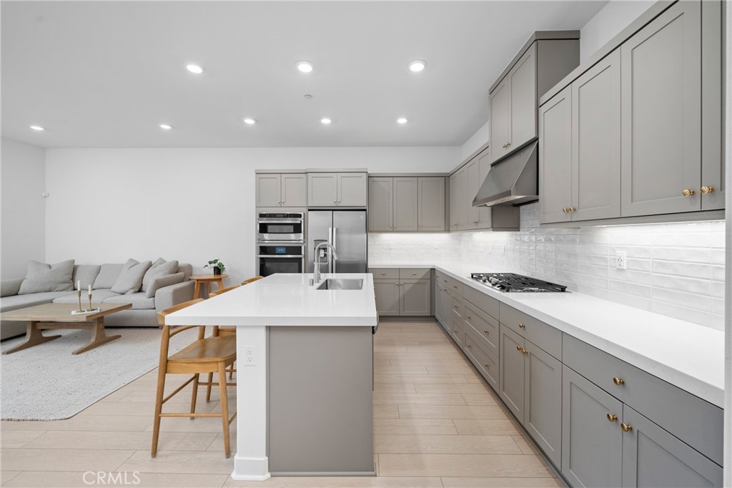 Perhaps the finest opportunity available in the coveted Solis Park community of Irvine right now, this well-appointed home is sure to impress. Enjoy the premier location within the community as it is a top-floor with no neighbors above and also short distance to neighborhood resort-style HOA amenities. This is a truly energy efficient home as it comes with owned solar (3190KW system, can generate ~265KW/month). Inside you'll find a spacious bedroom, beautiful bathroom, dedicated laundry closet, and sprawling living spaces bedecked with tasteful finishes. Soaring ceilings lend a sense of volume and grandeur that is truly unmatched. The floor plan is highly efficient and the open concept living area makes entertaining a true joy. The beautifully appointed kitchen features a center island and space for stylish eat-up counter space - fusing convince with practicality. The primary suite enjoys a large walk-in closet. One of the standout features of this property is the oversized storage unit, providing ample space for all your storage needs—a rare find that adds significant value and convenience. You'll love the close proximity to premier Irvine schools, Irvine’s Great Park region, and short drive to world-class shopping at Irvine Spectrum and Woodbury Town Center featuring community events, premier shopping, and highly-rated restaurants. This is a rare opportunity not to be missed.