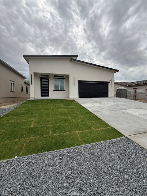 Photo of 16334 Avenida Gracia, Desert Hot Springs, CA 92240 (MLS # IV26149356)