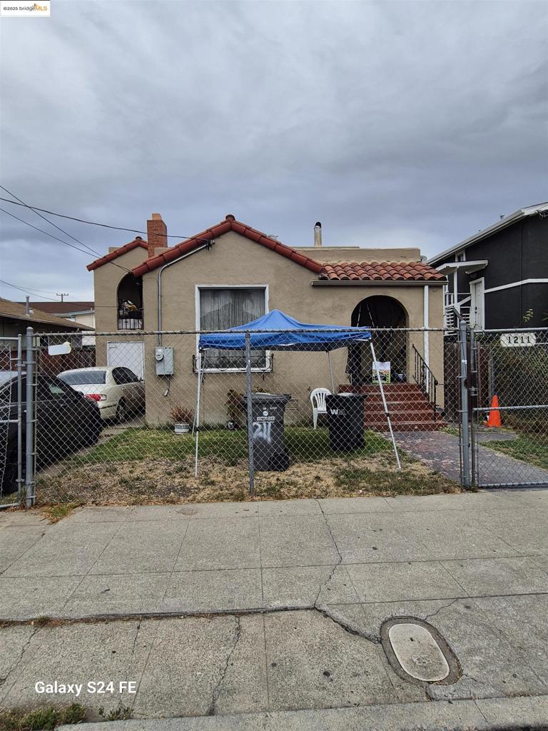 Situated in East Oakland, this charming bungalow at 1211 96th Ave offers a delightful mix of classic touches and real potential. Inside, you’ll find about 950 sqft of living space with 2 cozy bedrooms and 1 full bathroom—ideal for first-time buyers, or as an income property. The exterior catches the eye with its custom stucco walls and a tile roof that lend it architectural character and durability. While compact, the layout feels larger than the numbers suggest, thanks to thoughtful design elements and straightforward floor-plans.