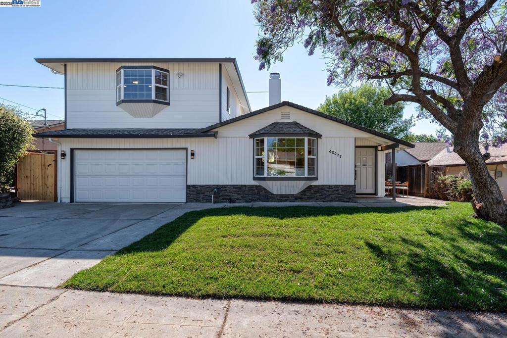 Beautifully upgraded east facing home in the highly sought-after Mission San Jose district with top-rated schools: Mission Valley Elem, Hopkins Jr. High & Mission San Jose High! This spacious 2,665 sq ft home on a 6,300 sq ft lot offers 5BR/3BA plus a large bonus room upstairs, perfect for a 6th bedroom, office, or den. A private upstairs in-law unit with separate entrance, 2BR/1BA offers incredible flexibility for extended family, rental income, or ADU use. The bright, open layout includes a living room with bay windows, cozy fireplace, and dining area with skylight. The remodeled kitchen features new quartz countertops, backsplash, stainless steel appliances, and freshly painted cabinets. Downstairs includes a spacious primary suite with two closets, new walk-in shower, double vanity, porcelain tile flooring, plus 3 more bedrooms and a fully renovated bath. Other upgrades include new luxury vinyl plank flooring (downstairs), recessed lighting, dual-pane windows, new interior/exterior paint, central heating, and brand-new A/C (downstairs). Fresh landscaping with new lawn. Close to Lake Elizabeth, shops, restaurants, Fremont Library, BART & easy access to I-680/I-880. Don’t miss this rare opportunity! Welcome Home!
