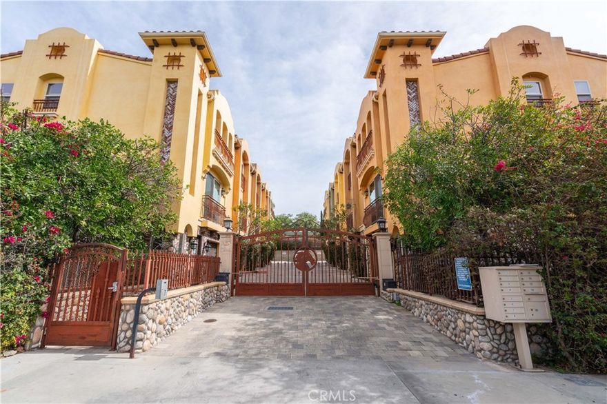 This stunning 2012 built townhouse is located in one of Tujunga’s most sought-after gated communities and as soon as step inside you’ll immediately recognize the owner’s true “Pride-Of-Ownership.”  Here are just a few of its many other outstanding features: Custom hardscape, ornate gates, and stone facade enhance its eye-catching curb appeal.  You’ll step into a flowing 1,700 square foot floor plan that is in “Move-In-Condition” with recessed lighting, elegant crown molding, a designer paint scheme, striking architectural accents, and complementary laminate flooring.  The spacious living room is bathed in natural light from the sliding glass balcony door, and has a gas-burning fireplace with elegant hearth, ½ guest bathroom, plus the staircase’s custom iron railings adds a luxurious touch. The family’s cook is going to truly appreciate the kitchen’s abundant custom cabinets, ample granite counters with back-splash, durable dual basin stainless steel sink, built-in stainless steel appliances, large breakfast bar, and the convenience of the adjoining dining area,  3 bedrooms; The grand suite has a large walk-in closet, and a sumptuously appointed bathroom with a large dual sink mirrored vanity with cosmetic station, soothing spa tub, and large glass enclosed shower.  A total of 3½ bathrooms. Functionally located laundry area.  Energy efficient dual pane windows will help keep your utility bills low and the interior very quiet. Central air & heat for year-round comfort. 2 car direct access tandem garage. Located in a picturesque quiet community that’s surrounded by local parks, hiking trails, and it’s just minutes away from shopping, dining, and grocery stores.  Call now for all the details and I’ll gladly arrange your private tour.