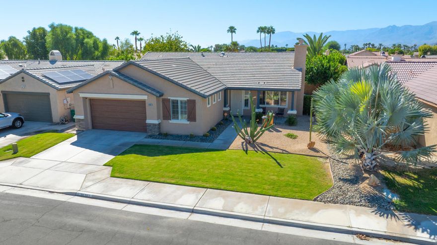 In the heart of Indio lies Montego Dunes, a highly sought-after neighborhood popular with both locals and investors for its ideal location near Highway 111, JFK Hospital, and the Empire Polo Club--home of the Stagecoach and Coachella music festivals.Arriving at 80683 Martinique, you'll immediately notice the pride of ownership reflected in its excellent curb appeal and well-kept exterior. Step inside and you'll love the bright, open great room where the kitchen, living, and dining areas seamlessly flow together--perfect for modern living. The efficient kitchen offers generous countertop and cabinet space, thoughtfully positioned at the center of it all.The primary suite is privately situated at the rear of the home, featuring a large sliding glass door that floods the room with natural light and opens to the beautifully landscaped backyard. Two additional bedrooms are conveniently located near the second bathroom, while the fourth bedroom is an expanded bonus room--ideal as a studio, home gym, or professional office.Just one house away, you'll find a charming community park with a grassy play area, shaded playground, and benches--alongside a spacious, gated dog park with plenty of room and shade for your four-legged friends to let loose.Montego Dunes is loved for its small, quiet feel while being right in the middle of everything with NO HOA's! The sense of community is strong, and once you explore the 3D VR Tour, home, and neighborhood, you'll see exactly why residents love living at Montego Dunes.