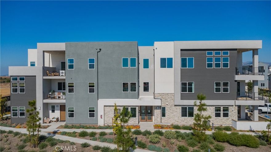 Very desirable Great Park resort-like Condo – Amaris. Just bring your luggage to enjoy this smart home with resort style of living. This is a previous model home. The home has all the original designer's furniture and artwork. You can navigate the home with your phones (Ring doorbell, Honeywell climate control, GE profile appliances, Rheem water heater, ChargePoint car charger, solar and battery systems).  The first floor of this new three-story condo features a two-bay garage, offering convenient entry. The garage has solar with a battery backup system. It also has a ChargePoint charger for your EV. An inviting open-concept floor plan covered deck and bedroom make up the second level. The upgraded GE profile appliances are the chef's dream. The 180-degree view with wild rivers water park, mountain and spectrum center view. You can also enjoy the fantastic sunset.  On the third floor, two bedrooms surround a generous loft with an attached deck, including the lavish owner's suite complete with a spa-inspired bathroom, recirculation pump and walk-in closet. The community provides wonderful amenities (10 parks) such as pool, clubhouse, pickle ball court, and scenic walking trails all just minutes away. You are just minutes away from the Great Park amenities (Wild River Water Park, tennis courts, baseball fields, soccer fields and ice rink). It is close to the Irvine Spectrum Center, City of Hope Hospital, Hoag hospital at Irvine, Costco warehouse and award-winning Saddleback Valley Unified School District. Property has installed solar panels which will save your electricity bill a lot.