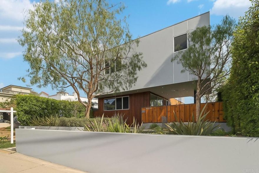 Exceptional Modern Luxury in the Heart of Venice, California! Experience the ultimate Southern California lifestyle in this rare, contemporary 4-bedroom, 4-bath masterpiece, ideally located just minutes from Abbot Kinney Blvd, the iconic Venice Canals, and the Pacific Ocean. Combining modern architecture, elegant updates, and long-term investment value, this home captures the best of coastal living in one of L.A.’s most desirable neighborhoods.  Built in 2012 and recently refreshed with new interior and exterior paint, the residence offers over 2,900 sq ft of open-concept living space that feels airy, bright, and sophisticated. Expansive walls of glass invite natural light to pour in, highlighting the brand-new hardwood floors that flow seamlessly throughout the home.  The chef’s kitchen is both stylish and functional, featuring granite countertops, rich custom cabinetry, premium stainless-steel appliances, a gas cooktop, built-in oven, and pot filler. A large center island with bar seating anchors the space perfect for morning coffee, family gatherings, or lively dinner parties with friends.  From the kitchen, the living and dining areas extend naturally into the private landscaped yard, creating an effortless indoor-outdoor experience. The backyard offers room for al-fresco dining, relaxing under the California sun, or enjoying quiet evenings surrounded by lush greenery—an entertainer’s dream.  Upstairs, the primary suite provides a tranquil retreat complete with oversized windows, modern shades, and space for a sitting area or home office. The spa-inspired ensuite bathroom features dual vanities, designer tilework, and an oversized shower, blending luxury with everyday comfort. Three additional bedrooms are generously sized and flexible—ideal for guests, a home gym, or creative workspace.  All bathrooms showcase custom cabinetry, premium fixtures, and cohesive design details, reinforcing the home’s sense of quality and sophistication. Additional features include recessed lighting, integrated media wiring, a full laundry room, and a two-car garage with extra storage.  Beyond the walls of this stunning property lies everything that makes Venice special. Stroll or bike to the beach, explore boutique shops and cafés on Abbot Kinney, or spend weekends discovering art galleries, local farmers’ markets, and award-winning restaurants. With its proximity to Silicon Beach, Santa Monica, and Marina del Rey, this address offers both luxury living and incredible convenience.  Whether you’re seeking a primary residence, vacation home, or investment opportunity, this property delivers on every level—modern design, unbeatable location, and long-term value in a neighborhood where lifestyle meets legacy.