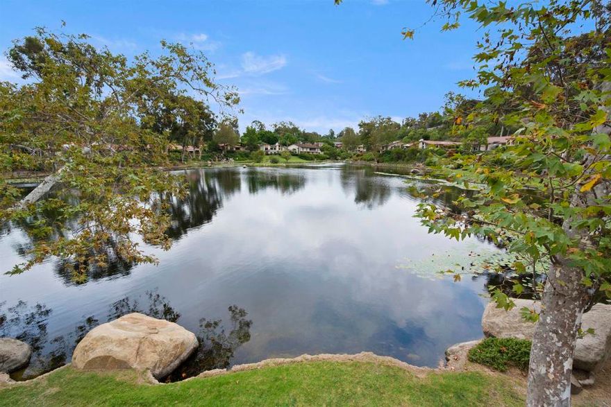 WOW! This once in a generation,beautifully remodeled lake front single story home has it all! On nearly 1/4 acre, this lake front home has some of the best views in all of San Diego and has recently been remodeled. The chef's kitchen with 2 sinks, 2 oversized islands, 42 inch built in refrigerator and 48 inch gas range, comes with full slab porcelain counters and backsplash. Wide plank white oak floors and oversized baseboards are installed throughout the home. Smooth wall and ceiling texture was applied throughout the house, including new paint on the interior and exterior.  All 3 full bathrooms have brand new custom tile, vanities and fixtures. Lots of custom details are seen throughout the home like multiple wood ceilings and custom entertainment center. Homes of this quality rarely become available, especially lake front in this small enclave gated community. Must see to appreciate..