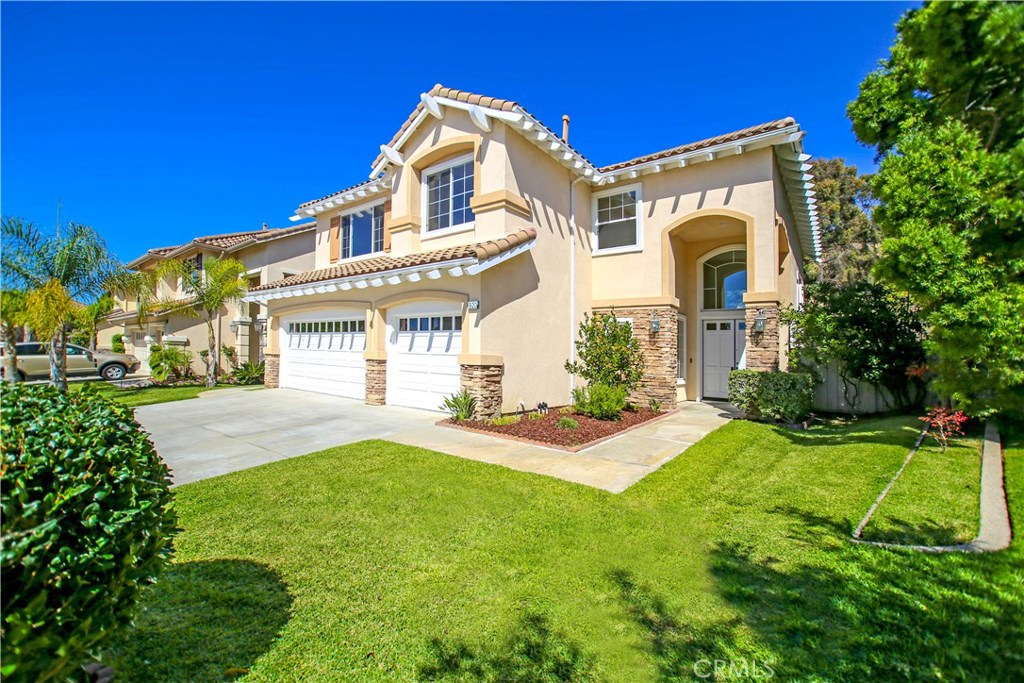 Located in The Harbor Ridge Community of Rancho San Clemente in the City of San Clemente. This Large Home sits on a Lot over 8,100 Square Feet with a Good Size Back Yard that includes Fruit Trees & Grape Vines. The Home is about 2,900 Square Feet with Four Upstairs Bedrooms, Three Full Bathrooms and Laundry Room. The Kitchen has Stainless Steel Appliances & includes an older white Refrigerator in the garage. Kitchen is Open to the Large Living Room w/ Fireplace. The Formal Dining area is open to the Family Room with Soaring High Ceilings. There is an enclosed Fifth Bedroom/Office space Downstairs with attached Bathroom w/Shower. The Home has a Three Car Garage with a Large Driveway. This Pet Friendly Home has a Large, Private back yard w/Fruit Trees & Grape Vines & Mature Trees on each side. The hillside behind the home has Trees, Vegetation and No other Homes. This Awesome Family Home is Clean and Ready for occupancy. Submit on Pets.