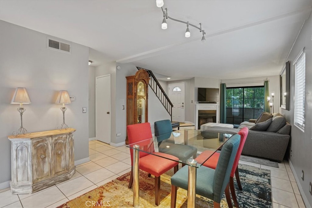 This spacious end-unit condo offers the feel of a single-family home at a townhome price. The open concept living and dining areas flow seamlessly, making entertaining a breeze. A beautifully updated kitchen opens directly to your private patio, with views of the pool and newly renovated jacuzzi. Upstairs, you’ll find two generous primary suites, each with an en-suite bathroom and ample closet space. Additional features include in-unit laundry, central air/heat, and gated parking for two vehicles. Enjoy gorgeous dark wood floors upstairs, cool tile flooring downstairs, and the comfort of living in a small gated building. This home is walking distance to shops, dining, parks, and transit, with quick access to major freeways for an easy commute. It’s the perfect balance of comfort, style, and convenience. *New Price Improvement!*