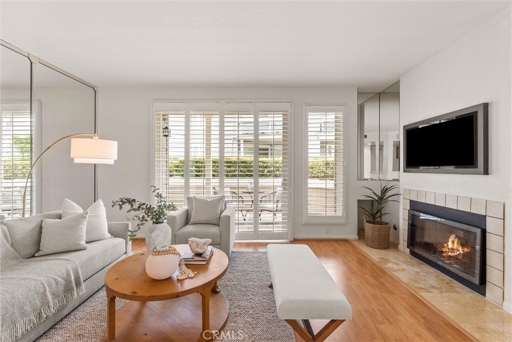 Embrace the Huntington Beach lifestyle in this rarely available corner-unit Carmel floorplan in the coveted Pacific Ranch community. With no neighbors above or below, you’ll enjoy the peace, privacy, and comfort of this stunning home, all just 1.5 miles from the sand.
Step inside to find a light-filled living and dining area, open to the kitchen, perfect for hosting friends after a day of surfing or soaking up the sun. The adjoining spacious patio offers the ideal spot to unwind and enjoy the cool evening breeze. There's also the convenience of in-unit laundry and a downstairs half bath for guests.
Upstairs, the two bedrooms each have their own full bathroom. The spacious primary suite has a large walk-in closet plus an ensuite bathroom with a skylight. It even has its own private balcony, a serene retreat for morning coffee.
This townhouse-style home has been nicely updated and lovingly maintained. Easy to maintain laminate flooring flows throughout. The kitchen and bathrooms have gorgeous granite countertops. Newer windows with beautiful plantation shutters save energy while bringing in natural light.
You’ll have the convenience of a one-car garage plus an assigned, dedicated covered parking space, though chances are you’ll be walking or biking everywhere! Centrally located, Pacific Ranch is a premier guard-gated community known for its lush greenbelts, sparkling pools, relaxing spas, and welcoming clubhouse. And when you’re not enjoying resort-style amenities at home, you’re right across from the Seacliff Shopping Center and just minutes to Pacific City, the pier, and endless dining and entertainment.
This isn’t just a home, it’s your front-row seat to the laid-back, sun-kissed Huntington Beach lifestyle. What a beautiful place to call home!