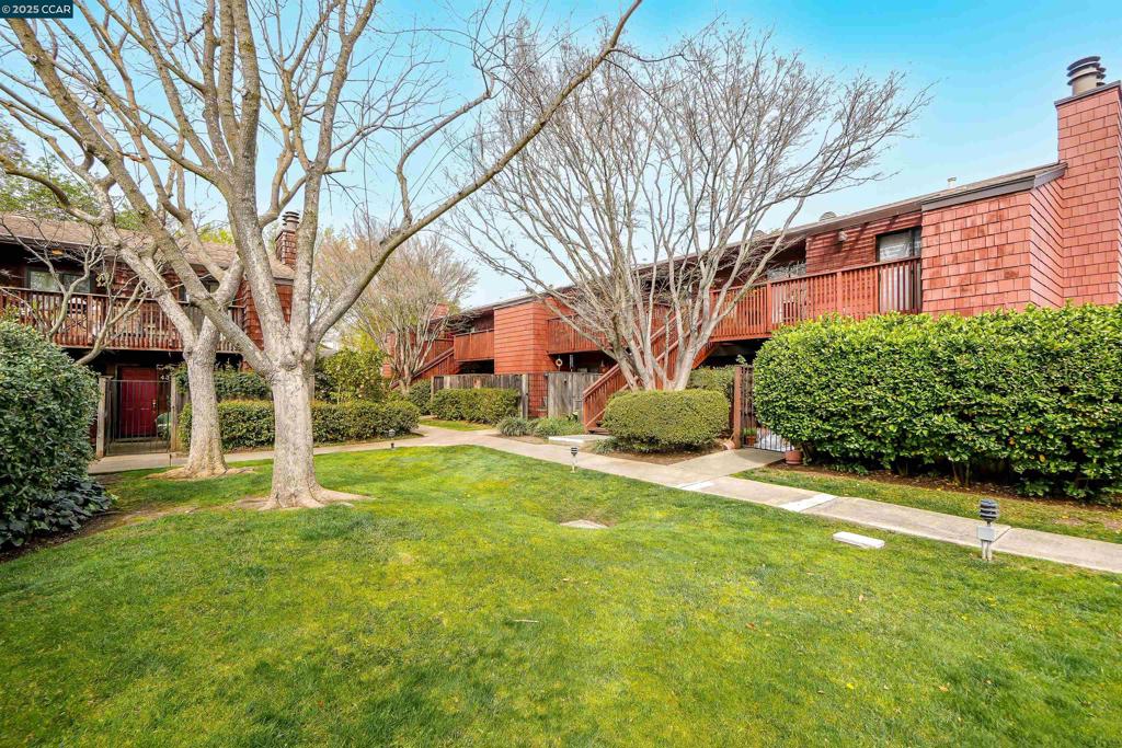 This charming 2-bedroom, 1-bath condo in the heart of Concord offers modern comfort and convenience. Rare end-unit boasts a cozy fireplace, an extra living room window for added natural light, updated bathroom, an in-unit washer and dryer, and ample storage. This quiet, well-maintained complex has a swimming pool and a charming gathering arbor. Nestled near the beautiful Newhall Community Park with direct gated access, enjoy walking trails, a dog park, and a scenic lake. Conveniently located - just 10 minutes to Concord Pavilion and right off Clayton Blvd, offering easy access to top dining and shopping spots. This home is perfect for first-time buyers or if you are downsizing. Don’t miss this fantastic opportunity—schedule a showing today!