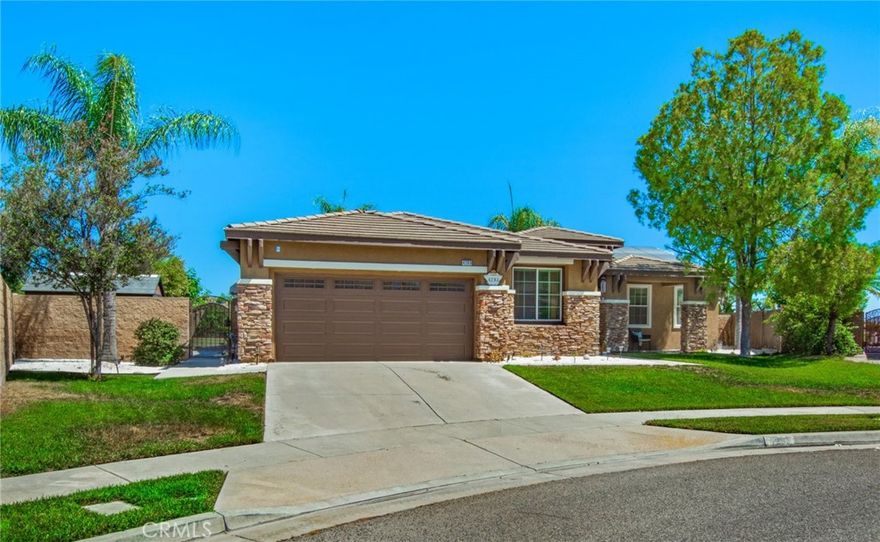 Excellent Cul-De-Sac location in the Community of Eagle Glen. Wonderful Single Level Home with Bright and Open Floor Plan with Tall Ceilings and an Abundance of Windows filling this Home with Natural Light. Comfortable Family Room with Wood Flooring, a Gas Fireplace and Entertainment Center. Family Room opens to Kitchen. Oversized Center Island overlooks the Family Room. Formal Dining Area and Living Room adjacent to Kitchen. Roomy Master Bedroom with a Large Walk-In Closet. Garden Tub and Glass Shower Stall in Master Bathroom along with a Dual Sink Vanity. Convenient Inside Laundry Room with Full Size Hook-Ups. Cool Central Air Conditioning along with Solar System. Attached Double Car Garage with Direct Access into Home and Long, Wide Driveway with more off street parking. Private Fenced Back Yard with Shady Covered Patio and Panoramic Views of the Mountains and City Lights. Close to Community Sports Park, Schools, Shopping, Freeway Access.