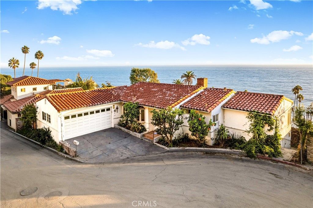 Photo of 17730 Posetano Road, Pacific Palisades, CA 90272 (MLS # SR25216939)