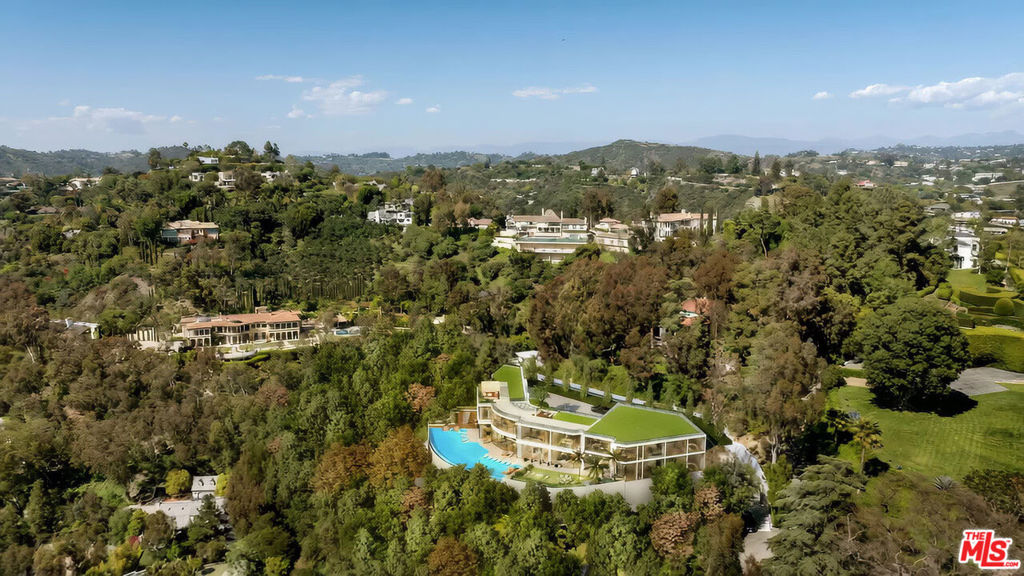Worldbid Auction of 901 Strada Vecchia Road, a rare and exceptional development opportunity (which is being sold at auction on July 15th) nestled in the tranquil hills of Bel Air, one of Los Angeles' most prestigious and desirable neighborhoods. This approximately 1.89-acre vacant lot sits at the end of a quiet cul-de-sac, offering ultimate privacy, breathtaking canyon views, and the foundation to build a world-class custom estate. With over $8 million in completed structural work and site infrastructure, including an existing foundation approved to build up to a 15,000 SF home is one of the most development-ready parcels in the city. Retaining walls, caissons, reinforced foundations, and utility access are already in place, offering a shovel-ready canvas for a visionary homeowner or developer.