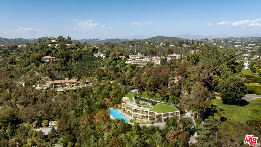 Worldbid Auction of 901 Strada Vecchia Road, a rare and exceptional development opportunity (which is being sold at auction on July 15th) nestled in the tranquil hills of Bel Air, one of Los Angeles' most prestigious and desirable neighborhoods. This approximately 1.89-acre vacant lot sits at the end of a quiet cul-de-sac, offering ultimate privacy, breathtaking canyon views, and the foundation to build a world-class custom estate. With over $8 million in completed structural work and site infrastructure, including an existing foundation approved to build up to a 15,000 SF home is one of the most development-ready parcels in the city. Retaining walls, caissons, reinforced foundations, and utility access are already in place, offering a shovel-ready canvas for a visionary homeowner or developer.