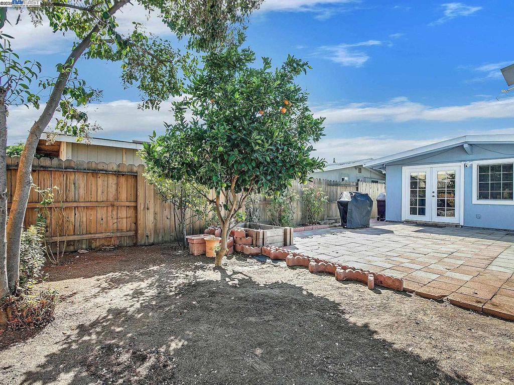 Step inside this updated Single Story Home with Gorgeous Eat In Kitchen, including Quartz Countertops, Beautiful Tile Backsplash, Stainless Steel Appliances with Gas Cook top Range, Vaulted Ceilings, and Island. Large Family Room with Dining Area is Adjacent to the Kitchen. Two Way Custom Tile Fireplace to Living Room/Kitchen Area. Three Bedrooms, Two Recently Updated Fantastic Bathrooms with Solid Surface Counters and Custom Tile. New Paint, Recessed Lighting, and Split Duct HVAC System that heats, cools and dehumidifies! Fenced Front and Back Yards with Patio Area and fruit tress.