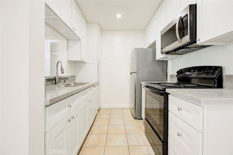 Photo of 5460 White Oak Ave AVE #K301, Encino, CA 91316 (MLS # GD26142137)