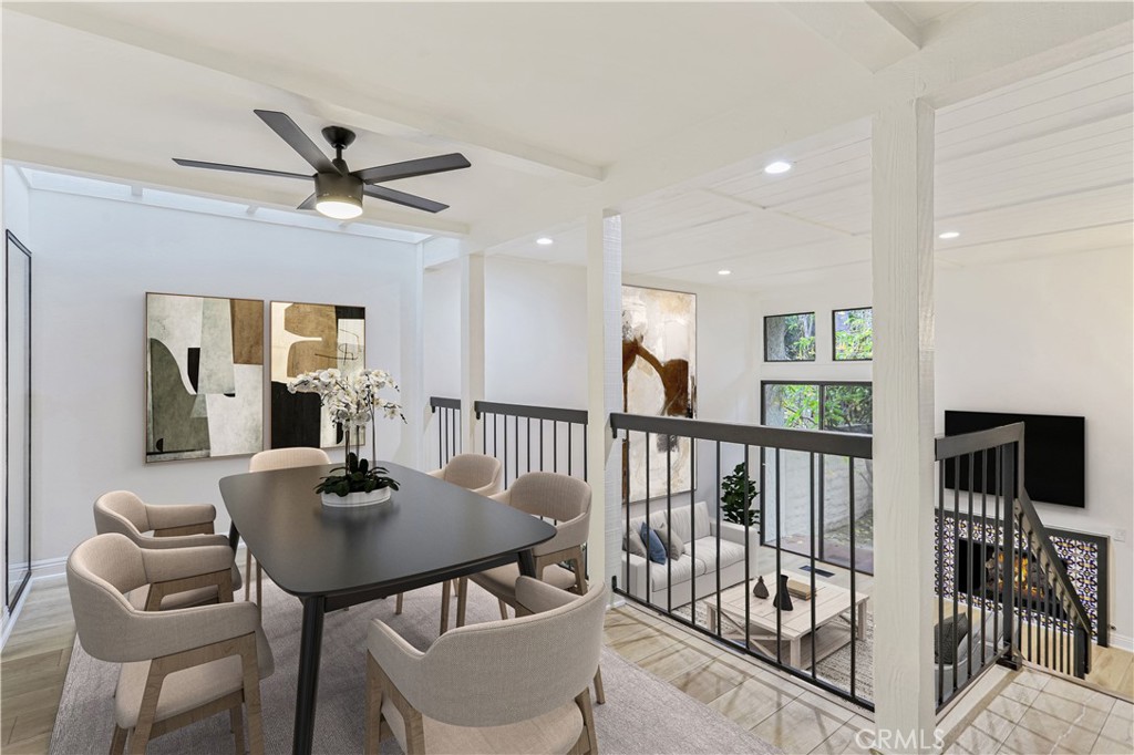 Beautifully updated 3-bedroom townhome with 2-car side by side attached garage in gated Oakcreek Condominiums across from the Calabasas Tennis & Swim Center in the heart of Calabasas. A quiet rear location within the complex; light-filled, double-height living room features wood laminate wide plank floors, a mosaic-tile fireplace, oversized windows and sliding glass doors to a private, gated courtyard patio—perfect for easy indoor/outdoor living. A large open formal dining area overlooks the living room and connects to the chef’s kitchen with stainless appliances, granite counters, and wall-to-wall cabinetry. A flexible main-level bedroom/office with an adjacent bath is perfect for guests or work from home. Upstairs, the large primary suite is a true retreat and includes vaulted ceilings, a fireplace, private balcony, multiple closets including a huge walk-in and a spa inspired bathroom with dual sinks. The third bedroom is light and is adjacent its own full bath. Additional highlights include in-home laundry and built-in storage in the private attached 2-car garage. Set within a gated community and a short stroll to The Commons at Calabasas dining, shopping, markets, theater, Saturdays Farmers Market and transportation. Within the Las Virgenes Unified School District; Bay Laurel, A.C. Stelle and Calabasas High School.