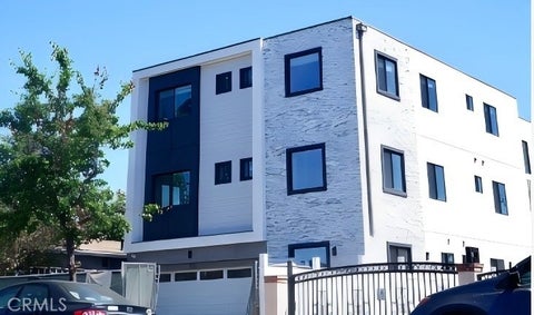 Photo of 3020 S Normandie Street, Los Angeles, CA 90007 (MLS # SB26123785)
