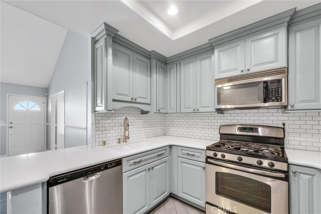 ****Value Range Priced *$548,000-$598,000***Wow! Super Adorable 2 bedroom 2 bath upper level condo with 1 ca garage in the Hills of Orange. Excellent premium interior location overlooking greenbelt. Open & completely remodeled kitchen with quartz countertops, soft touch cabinets, recessed lighting & stainless steel appliances including 5 top gas range/oven. Newly painted with new vinyl plank flooring in both bedrooms. Wonderful primary suite featuring two slider closets and remodeled bathroom with walk-in shower. Other great features include vaulted ceilings in bedrooms and living room, full size indoor laundry & private front entrance with patio. Resort style pool & spa and barbecues and there is another separate pool and spa location to enjoy for Canyon Hills residents only. Water/trash included with dues. Peaceful living in the Hills Of Orange. Enjoy walk paths and hiking trails right across the street. Convenient access to toll roads, Peter's Canyon, Irvine Regional Park and 55/91 freeways. Best of all, no Mello Roos taxes. You are going to Fall in love with this one!