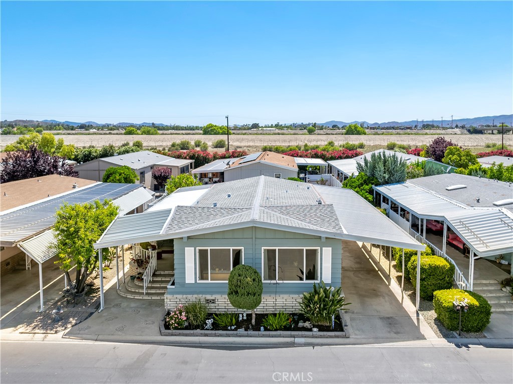 Presenting an incredible opportunity to retire within your budget with this very affordable double wide with two bedrooms and two baths over here in the senior community of Lake Park Soboba Springs. Built in 1977, well maintained and in impeccable clean turnkey condition. Wait until you see the magnificent views of the San Jacinto Mountain range from the Living Room . . . they are breath taking. The natural light this home offers is very refreshing. The kitchen offers all appliances including a refrigerator. We have a new roof. Additional living space with the very spacious CaliforniA Room. If you like quiet, be sure to stop over and see what this community has to offer. Thanks to the seller, Buyer will have free space rent for 3 months. wow what a huge savings for the Buyer.