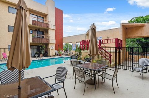 Photo of 8710 Independence Avenue #301, Canoga Park, CA 91304 (MLS # SR26092908)