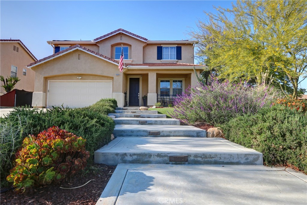 This home is a rare find, blending luxury, efficiency, and thoughtful design—inside and out— with features and upgrades that would cost well over six figures to recreate today. First time ever on the market too—an exceptional opportunity to own a home that’s been cherished by the original owners. If you're currently in escrow on another home, consider making the switch before it's too late — this property offers upgrades, quality, and features that are truly unmatched. Opportunities like this don’t come around often! Step into luxury and lifestyle with this beautifully upgraded home, located on an elevated corner lot with stunning curb appeal. Inside, you’ll find a gourmet kitchen that rivals custom homes, featuring a Viking Professional Appliance Suite, including a bold red 36” range, microwave, matching vent hood, and refrigerator. Quartzite countertops, custom cabinetry with glass inserts and soft-close pull-outs, an oversized island with bar seating, and a stainless steel farmhouse sink make this kitchen both elegant and functional. The walk-in pantry even includes a commercial-grade custom-built food dehydrator — perfect for culinary enthusiasts. The open-concept floor plan is grounded by durable wide-plank porcelain tile flooring and pre-wired surround sound in the living area. The primary suite is a true retreat, with dimmable recessed lighting, a spacious walk-in closet with built-ins, and your own infrared sauna—because we all deserve a little self-care! Step outside to your own private resort: a custom-built pool and spa with waterfall and reef bench, Heliocol solar heating system, and a built-in BBQ island topped with beige Napolina limestone and bar-height seating. Entertain effortlessly under the covered patio with recessed lighting, ceiling fans, and a Bose wired outdoor sound system — with speakers under the patio and in-ground throughout the backyard. Enjoy year-round ambiance with a gas fire pit and French doors leading out from the main living area. Sustainable and low-maintenance, the home features drought-tolerant landscaping, turf, decomposed granite, and drip irrigation in both the front and back yards. Seven dwarf fruit and citrus trees (peach, plum, apple, two lemon varieties, lime, and orange) round out this vibrant outdoor space. Come tour this home, today!
