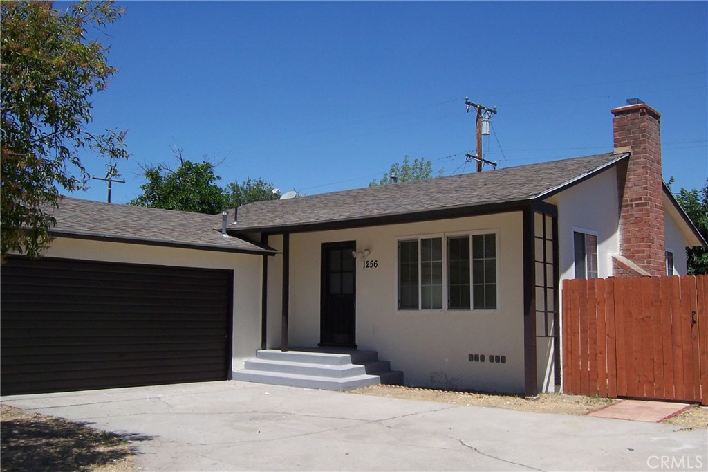 Very nice 2 bedoom 1 Bath home.Open front door to large living room with fireplace.Next to the living room is the Dining area that flows to the kitchen.Kitchen has a door that opens to the large deck and spacious back yard.Property has a new flooring,Fresh paint, and new appliances.We also have dual pain windows.2 car attached garage HAS 400 SQ.FT. Cooling is 3 wall a/c units,one in the living room and the other 2 in the bedrooms.