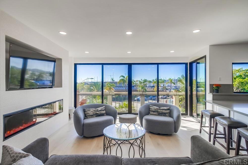 Beautiful coastal condo at the gateway to Shelter Island! Experience the best of coastal living in this stunning condo located just minutes from Shelter Island, the marina, Liberty Station, restaurants, shops, Art venues and Point Loma Village. This 2-bedroom, 2 bathroom condo features an open-concept layout with modern finishes, stainless steel appliances, and updated flooring throughout. The modern kitchen features stainless steel appliances, large windows fill the space with natural light, and a private balcony lets you enjoy the refreshing ocean breeze. Enjoy a spacious living area that opens to a private balcony—perfect for relaxing and taking in the ocean breeze. Welcome to Le Rondelet, a landmark of Point Loma. The community offers resort-style amenities including a pool, sauna, fitness center, and hot tub. With convenient access to waterfront dining, shopping, and scenic walking paths, this condo perfectly combines comfort, style, and location. Whether you’re looking for a full-time residence or a weekend retreat, this is San Diego coastal living at its finest!