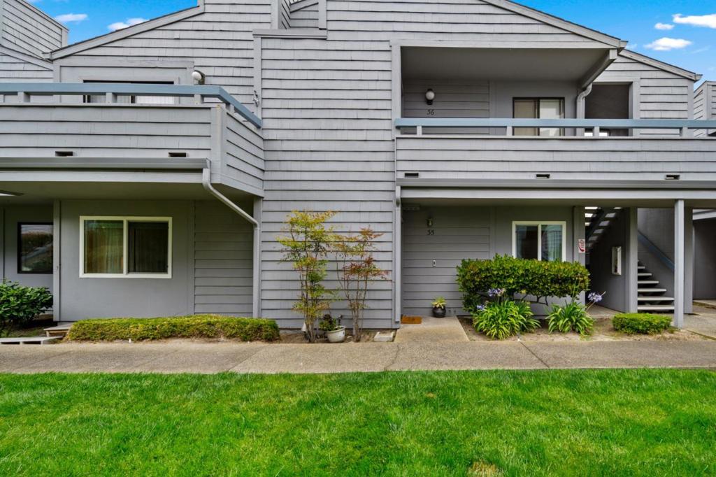 Welcome to this beautifully updated and accessible 2 bedroom, 2 bathroom ground-floor condo in the highly desirable, pet-friendly Peninsula Point community. Nestled in a quiet corner of the complex, this end unit offers both privacy and convenience, with easy guest parking just steps away. Step inside to discover a light-filled, open-concept living space featuring a refreshed kitchen with a modern layoutperfect for entertaining or everyday comfort. Elegant updated flooring flows throughout, complemented by newly tiled entryway and bathroom floors. Enjoy the practicality of an oversized pantry and in-unit washer/dryer, all designed to make daily living effortless. Thoughtful upgrades such as overhead ceiling fans and contemporary light fixtures add a touch of style and comfort throughout. Best of all, you're just a short stroll to the beach and scenic coastal trails, making it easy to embrace the Marina lifestyle. Whether you're looking for a full-time residence or a weekend retreat, this turnkey condo offers exceptional value in a vibrant, coastal community.