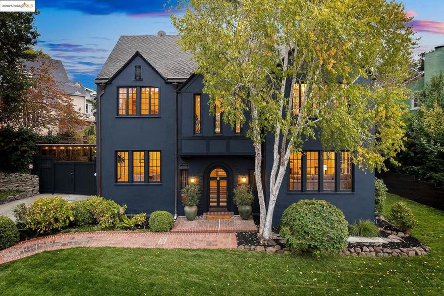Elegant Crocker Highlands Tudor blending architectural pedigree with modern refinement. Original details include arched doorways, rich woodwork, and abundant leaded French glass windows framing grand formal spaces. Chef’s eat-in kitchen with marble countertops, subway tile backsplash, custom cabinetry, and stainless steel professional appliances guaranteed to delight the chef of the household. Large, light-filled dining room perfect for the upcoming holiday season, and stately living room with French windows and wood-burning fireplace ideal for entertaining. Sultry, adjacent library with enchanting stone fireplace, inviting both conversation or quiet reprieve. Private rear gardens, patio, and turf ideal for entertaining or play. Additional features include two-car off-street parking with a secured carport and outlet for EV charger, large attic with potential expansion possibilities, basement area with double laundry system, and a flex space ideal as home gym. Minutes from award-winning elementary school, Grand-Lake shops and restaurants, Lake Merritt, and Bay Bridge to SF.