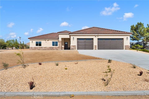 Photo of 15991 Tao Road, Apple Valley, CA 92307 (MLS # IG26143756)